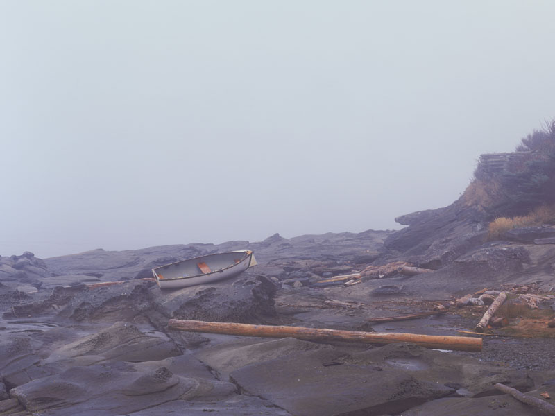 Beached boat in fog