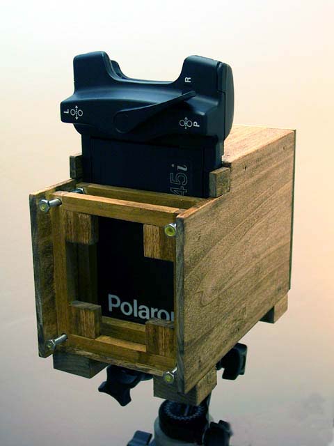 Pinhole camera with holder